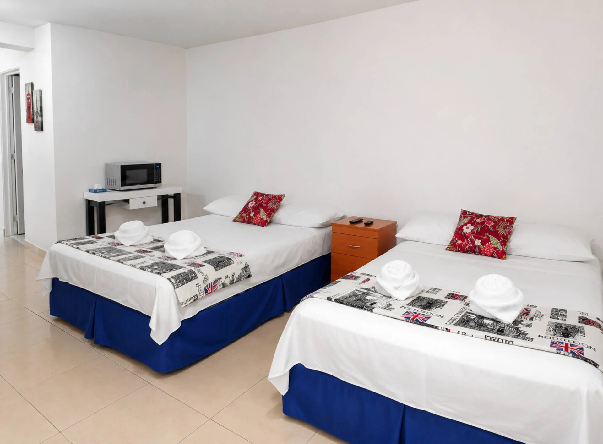 Habitación con dos camas matrimoniales